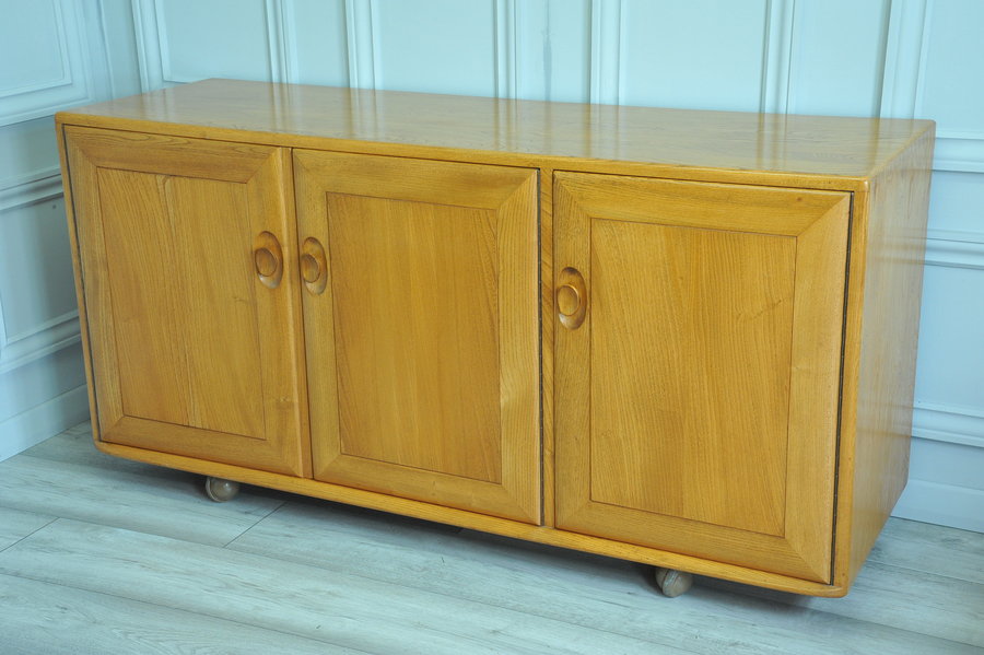 ercol three door sideboard