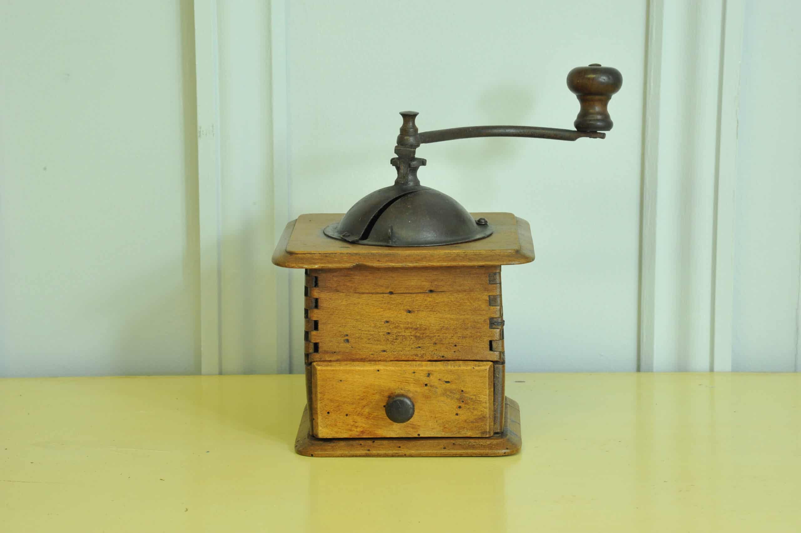 a vintage french coffee grinder