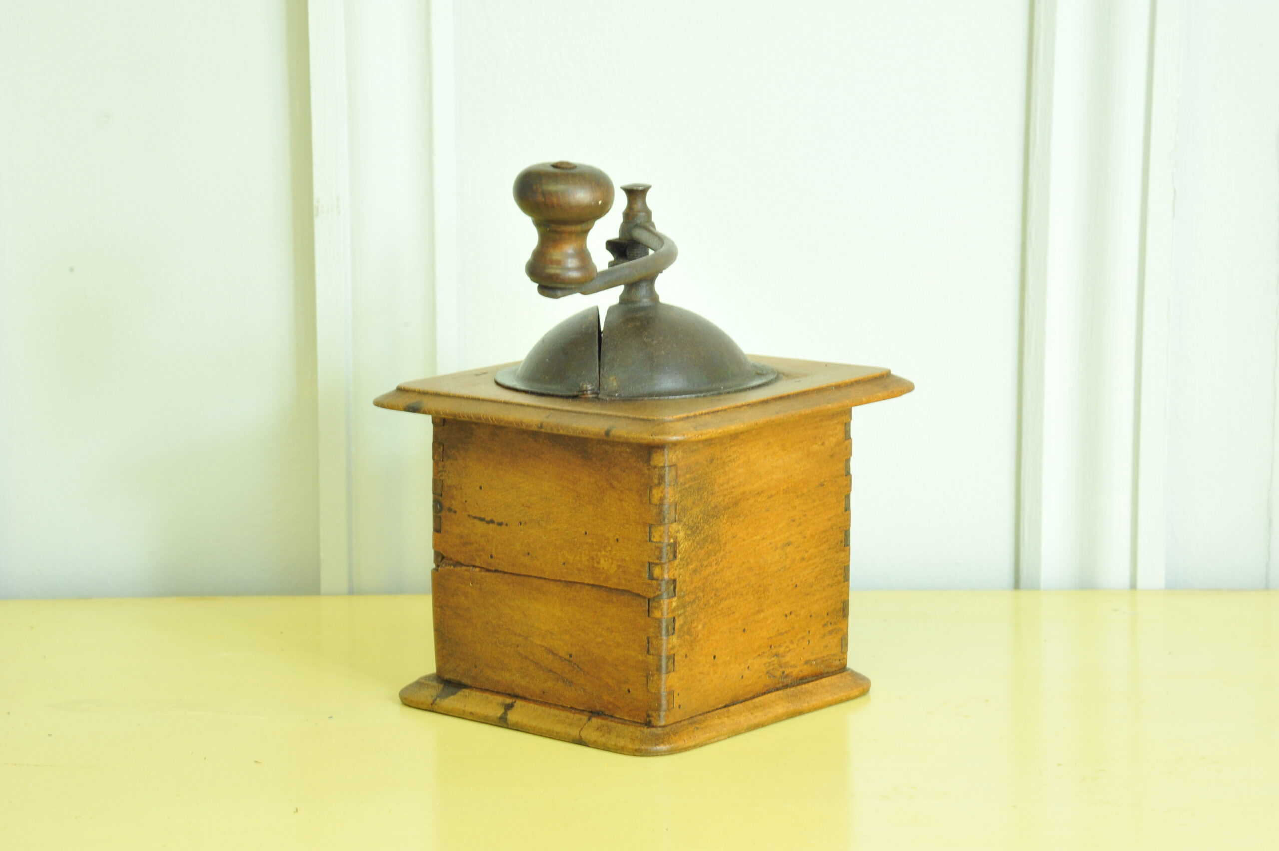 a vintage french coffee grinder