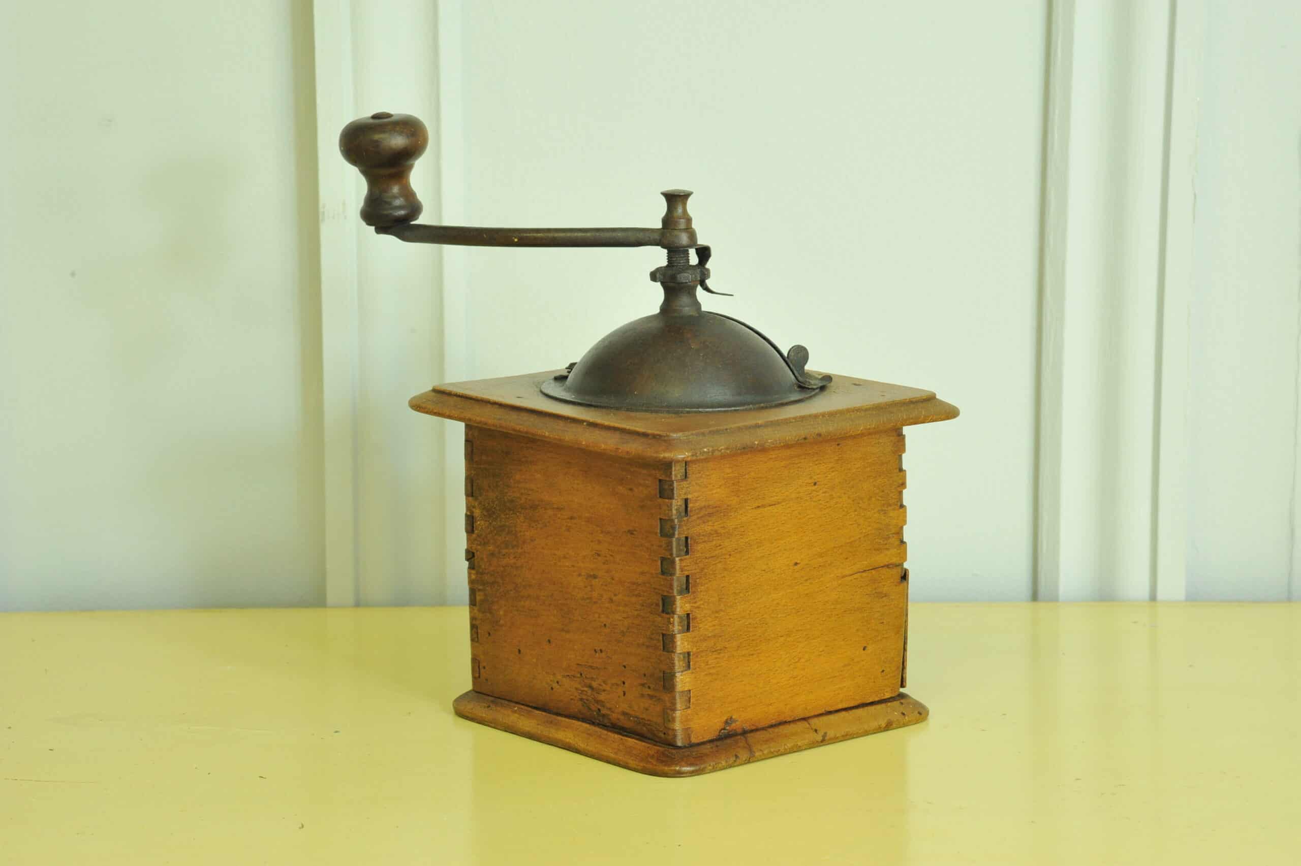 a vintage french coffee grinder