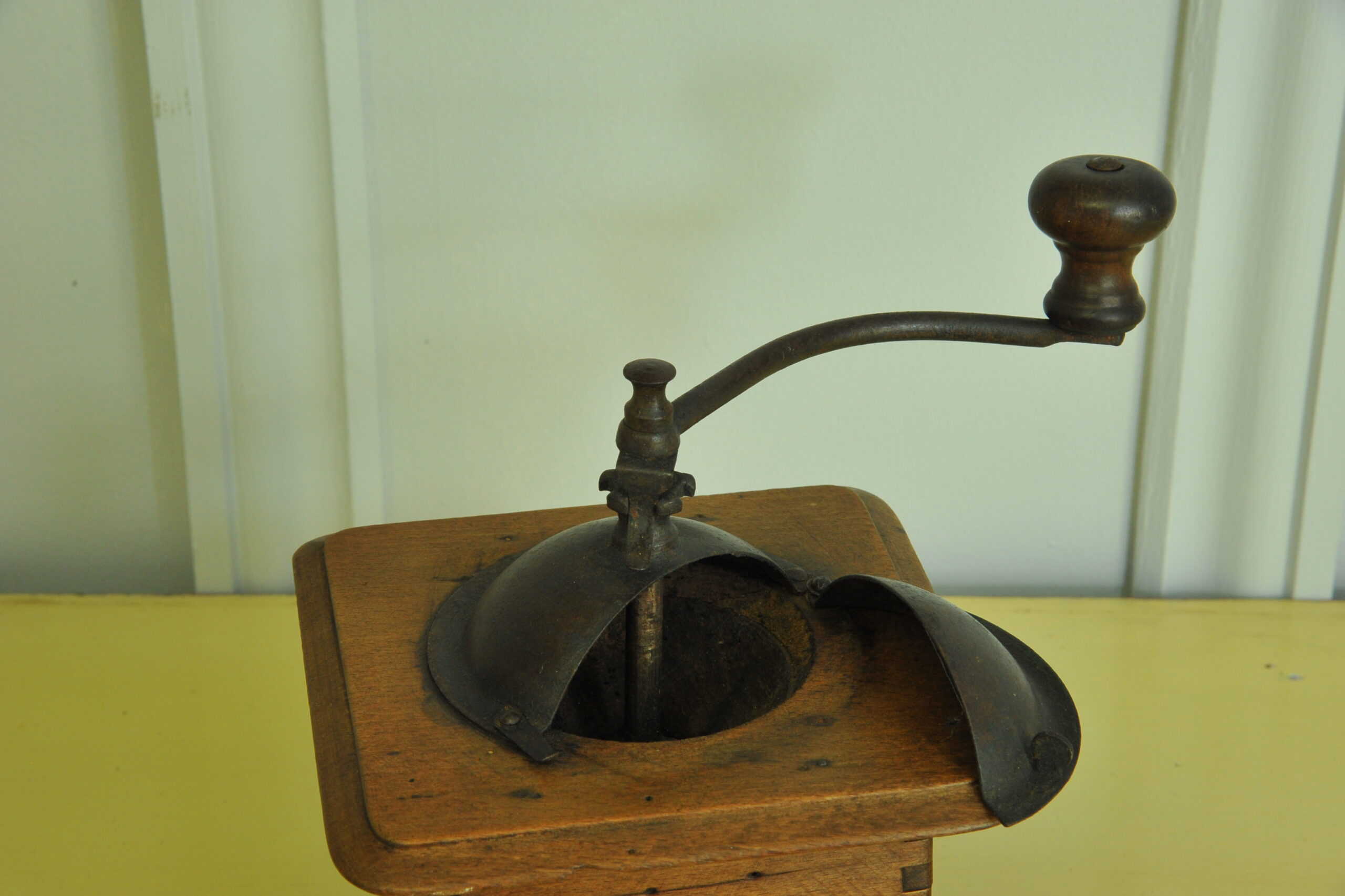 a vintage french coffee grinder