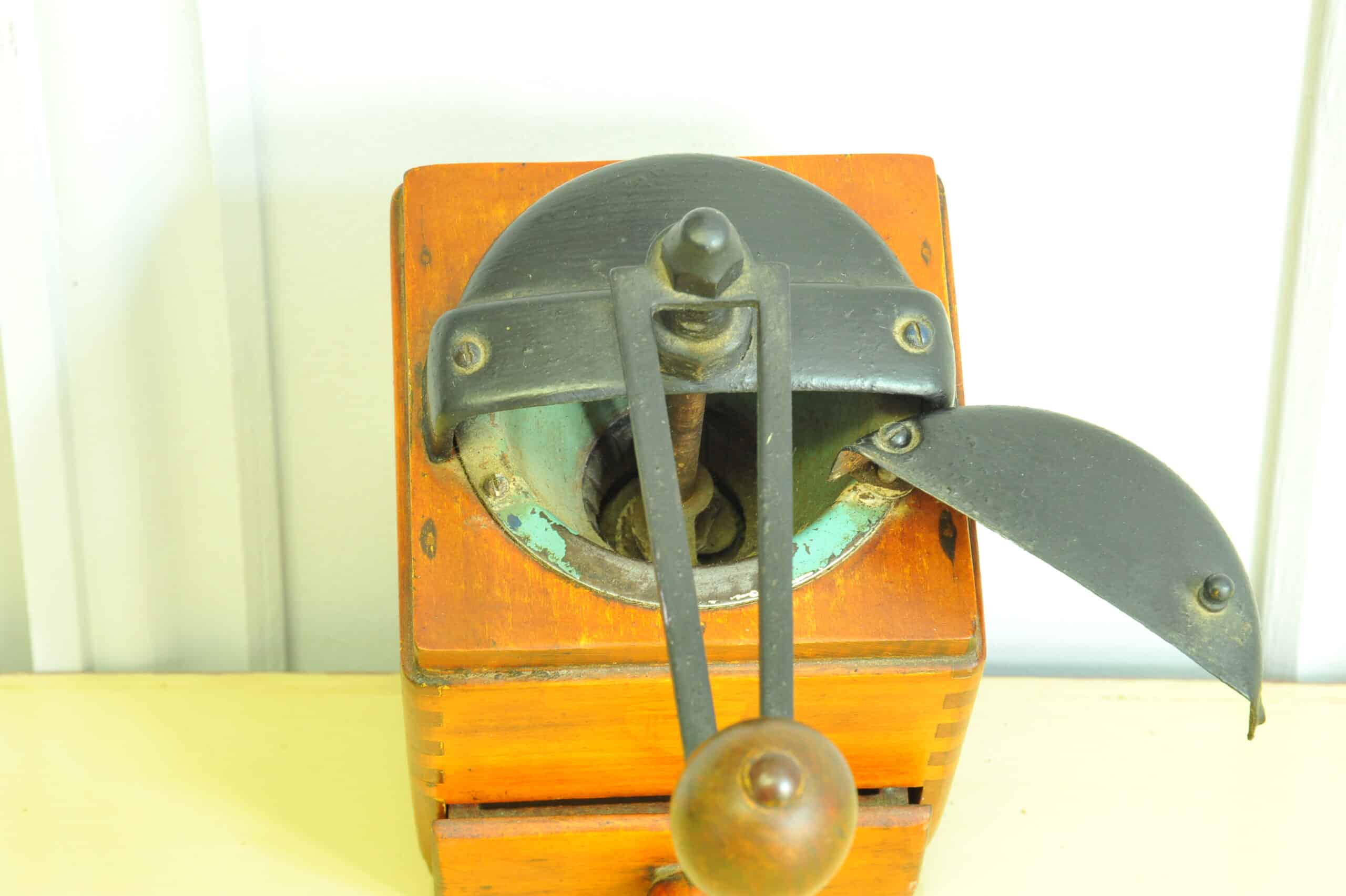 a vintage french coffee grinder