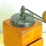 a vintage french coffee grinder