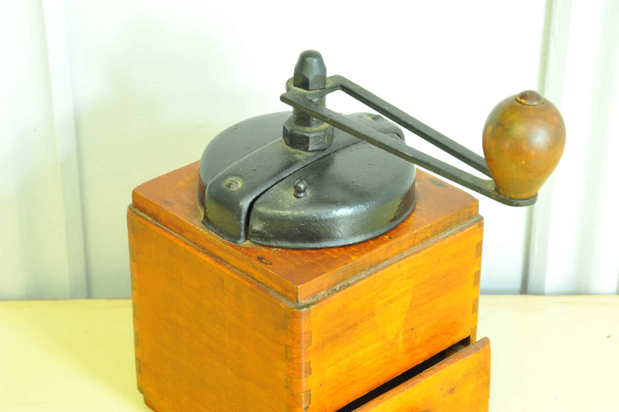 a vintage french coffee grinder