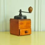 a vintage french coffee grinder