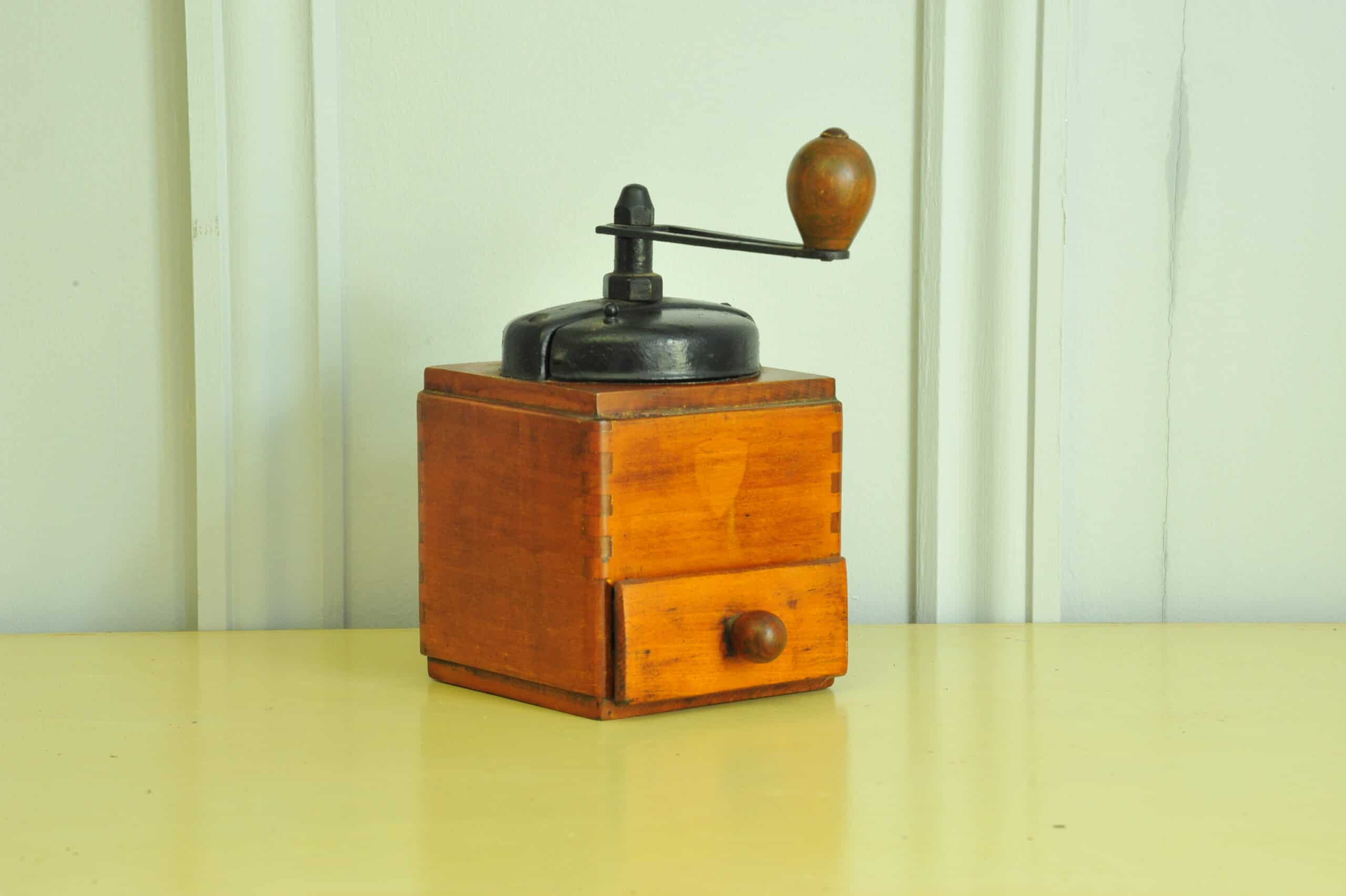 a vintage french coffee grinder