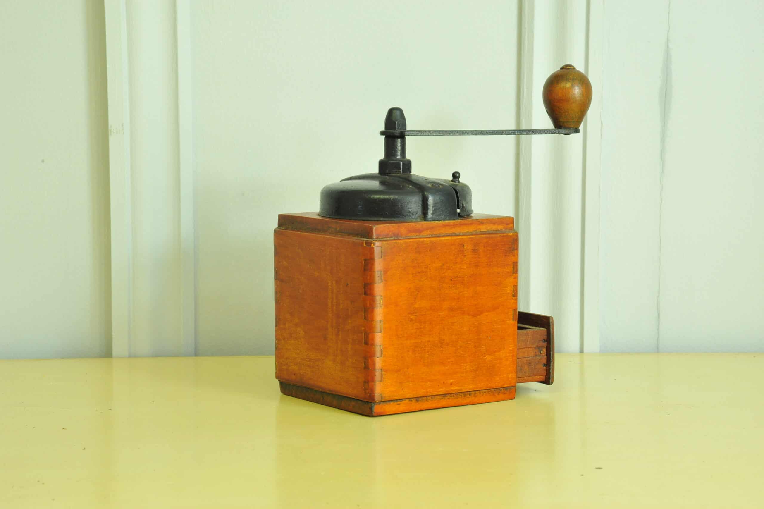 a vintage french coffee grinder