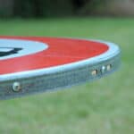 a vintage french cast iron road sign bistro café table