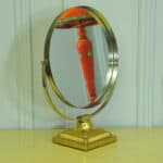 a vintage brass and steel dressing mirror by durlston designs