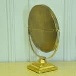 a vintage brass and steel dressing mirror by durlston designs