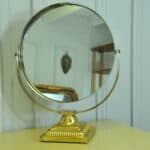 a vintage brass and steel dressing mirror by durlston designs