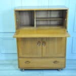 a vintage ercol drinks cocktail bureau cabinet