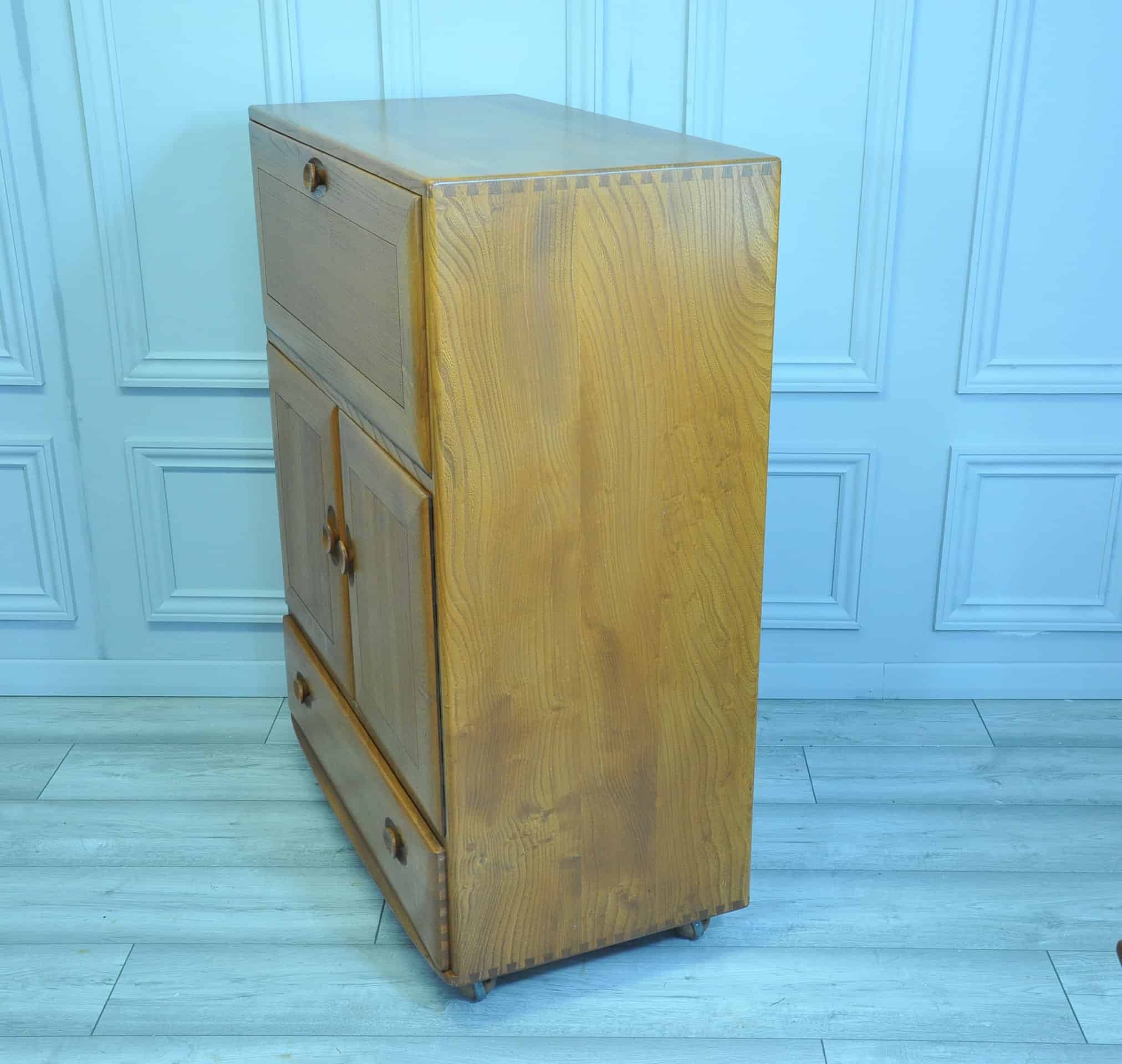a vintage ercol drinks cocktail bureau cabinet