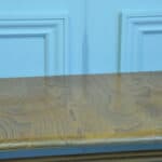 a vintage ercol long coffee table with under shelf