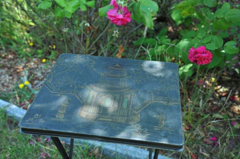 a vintage chinoiseries top metal folding table