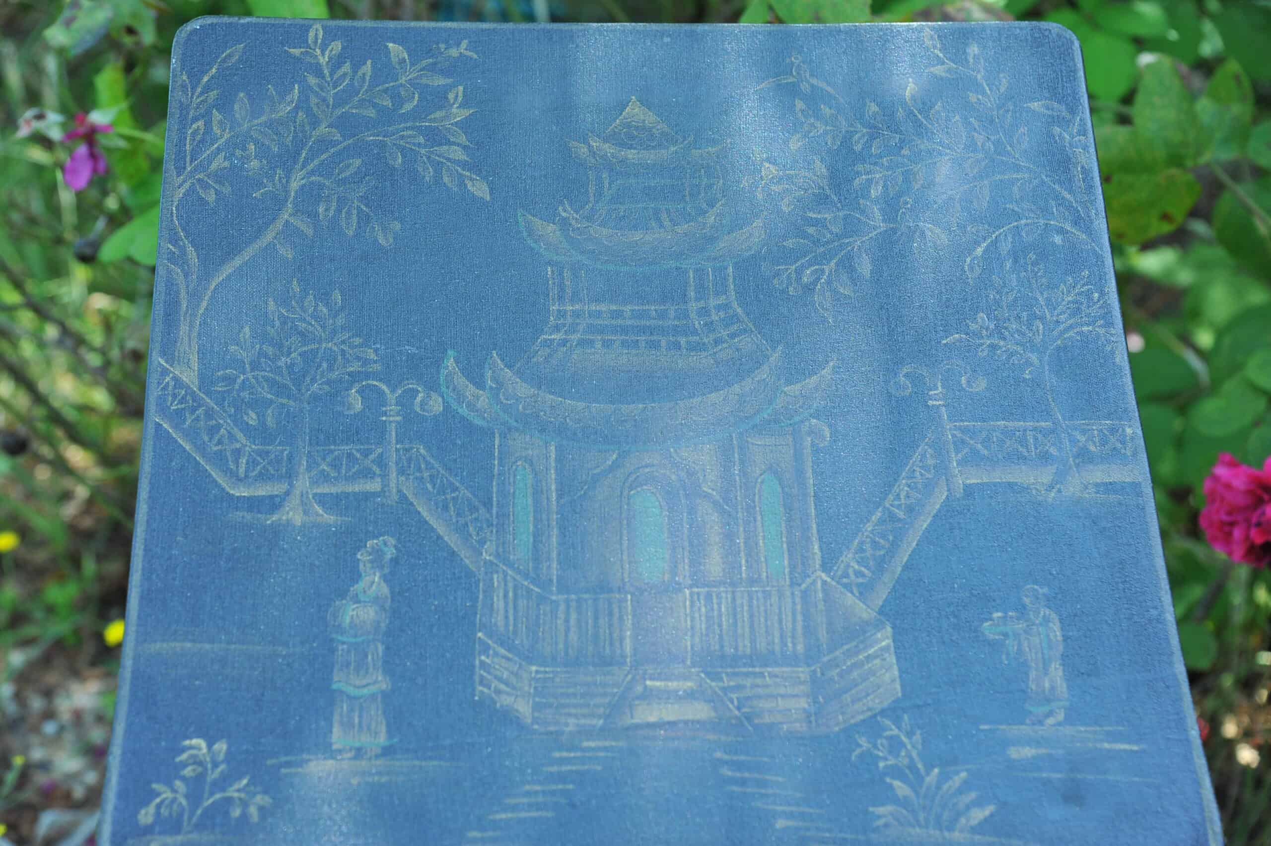 a vintage chinoiseries top metal folding table