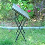 a vintage chinoiseries top metal folding table