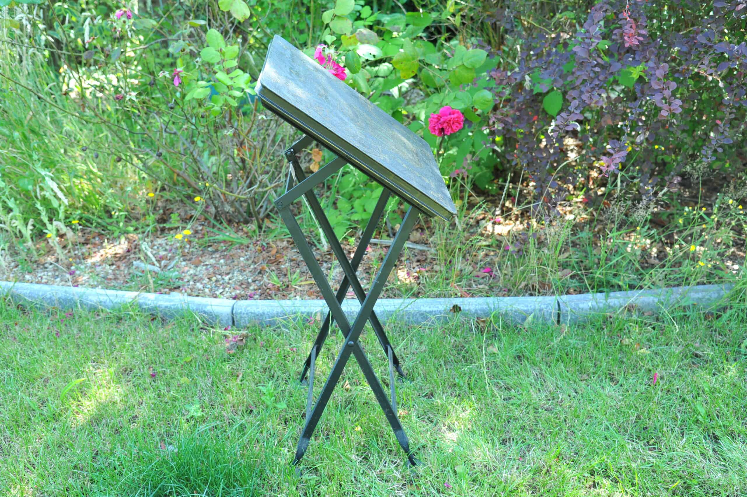a vintage chinoiseries top metal folding table