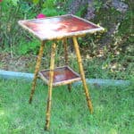 a good antique vintage two tier bamboo and lacquered panel side table