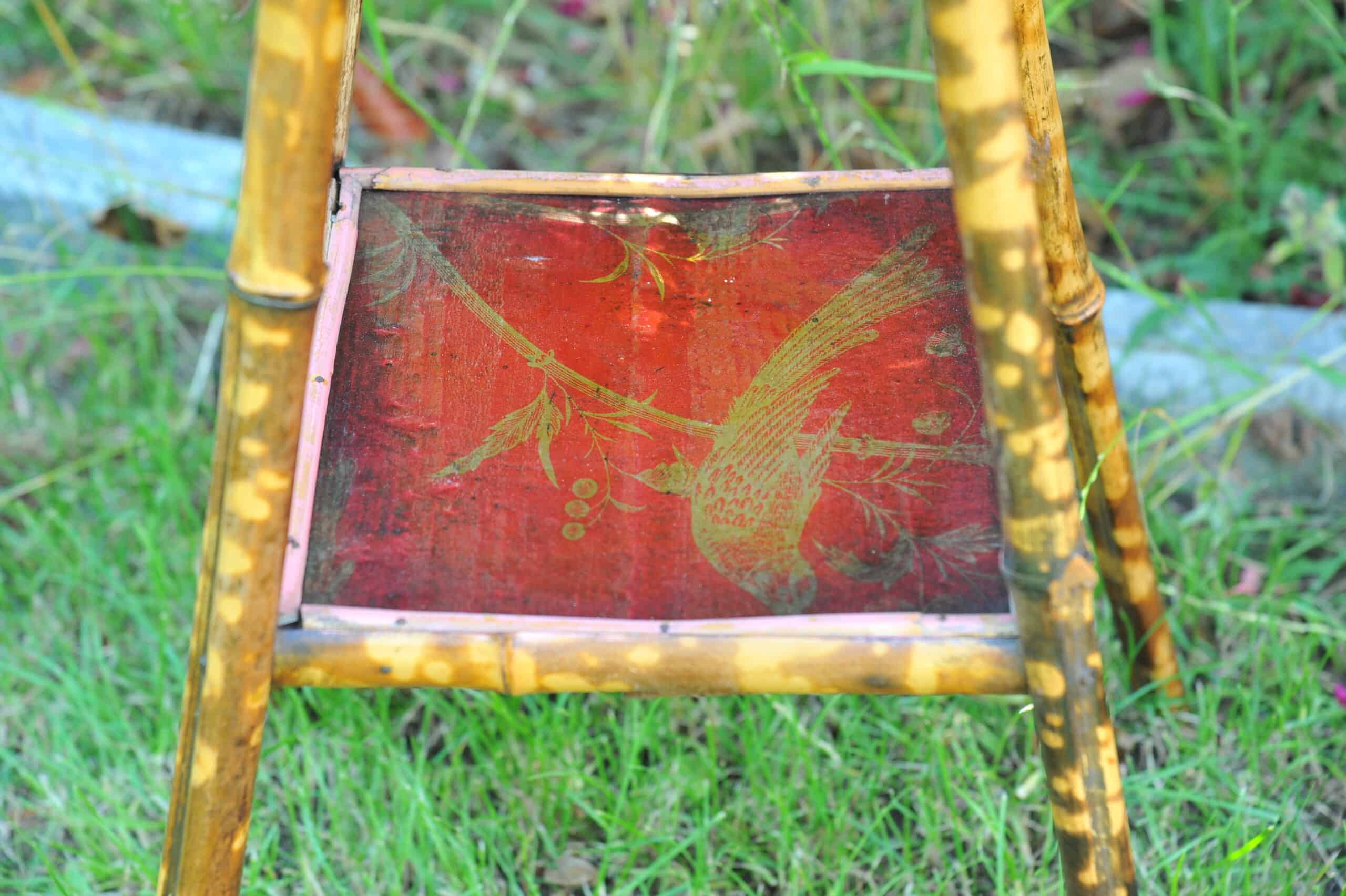 a good antique vintage two tier bamboo and lacquered panel side table