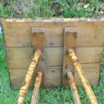 a good antique vintage two tier bamboo and lacquered panel side table