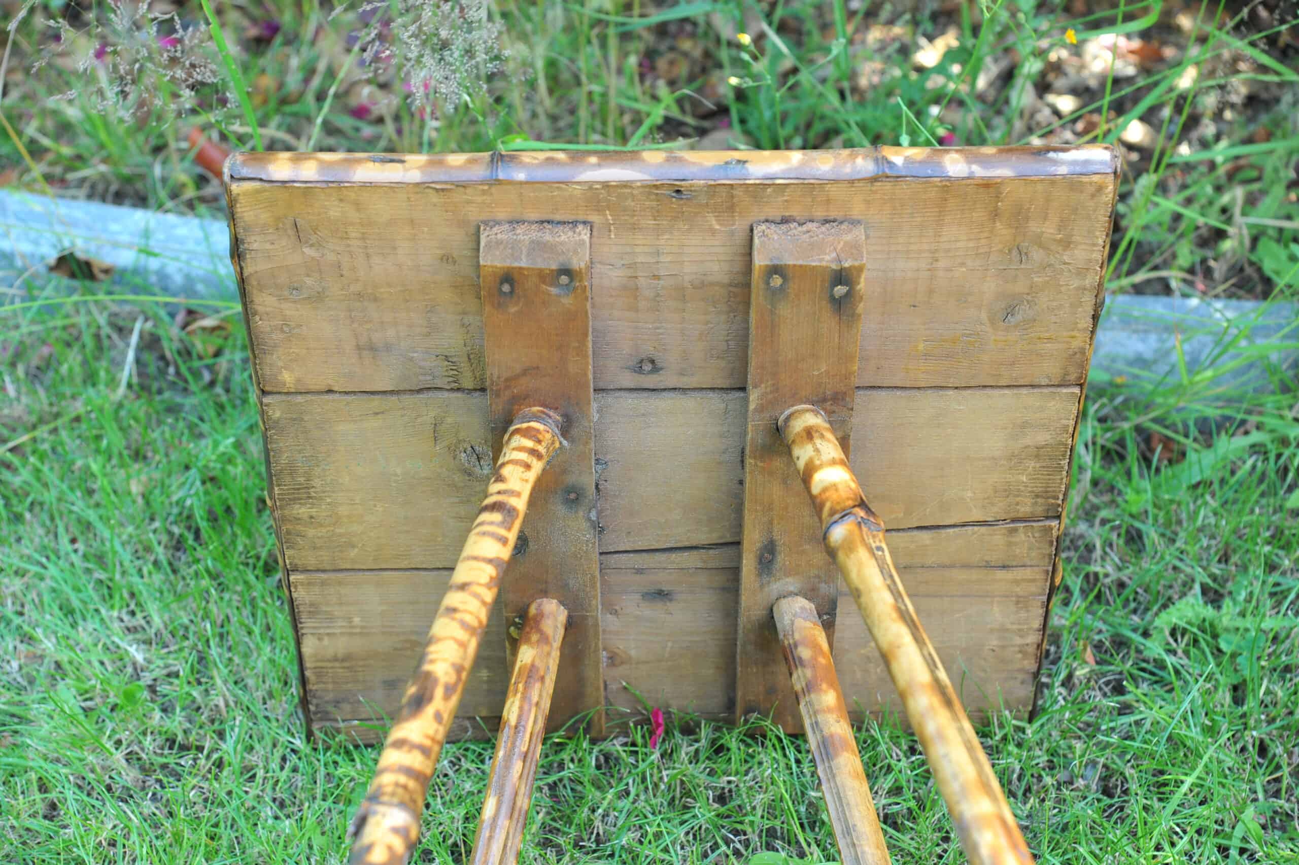 a good antique vintage two tier bamboo and lacquered panel side table