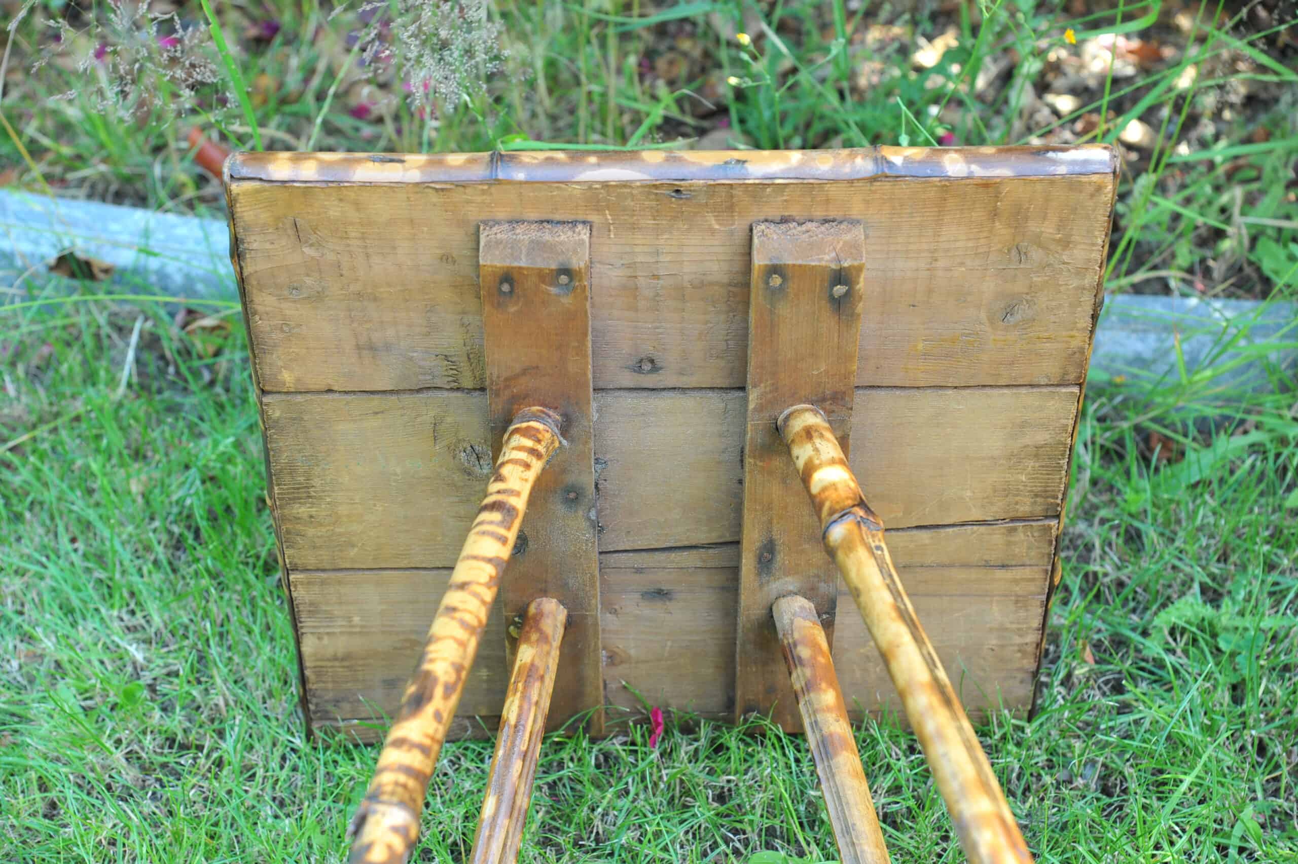 a good antique vintage two tier bamboo and lacquered panel side table