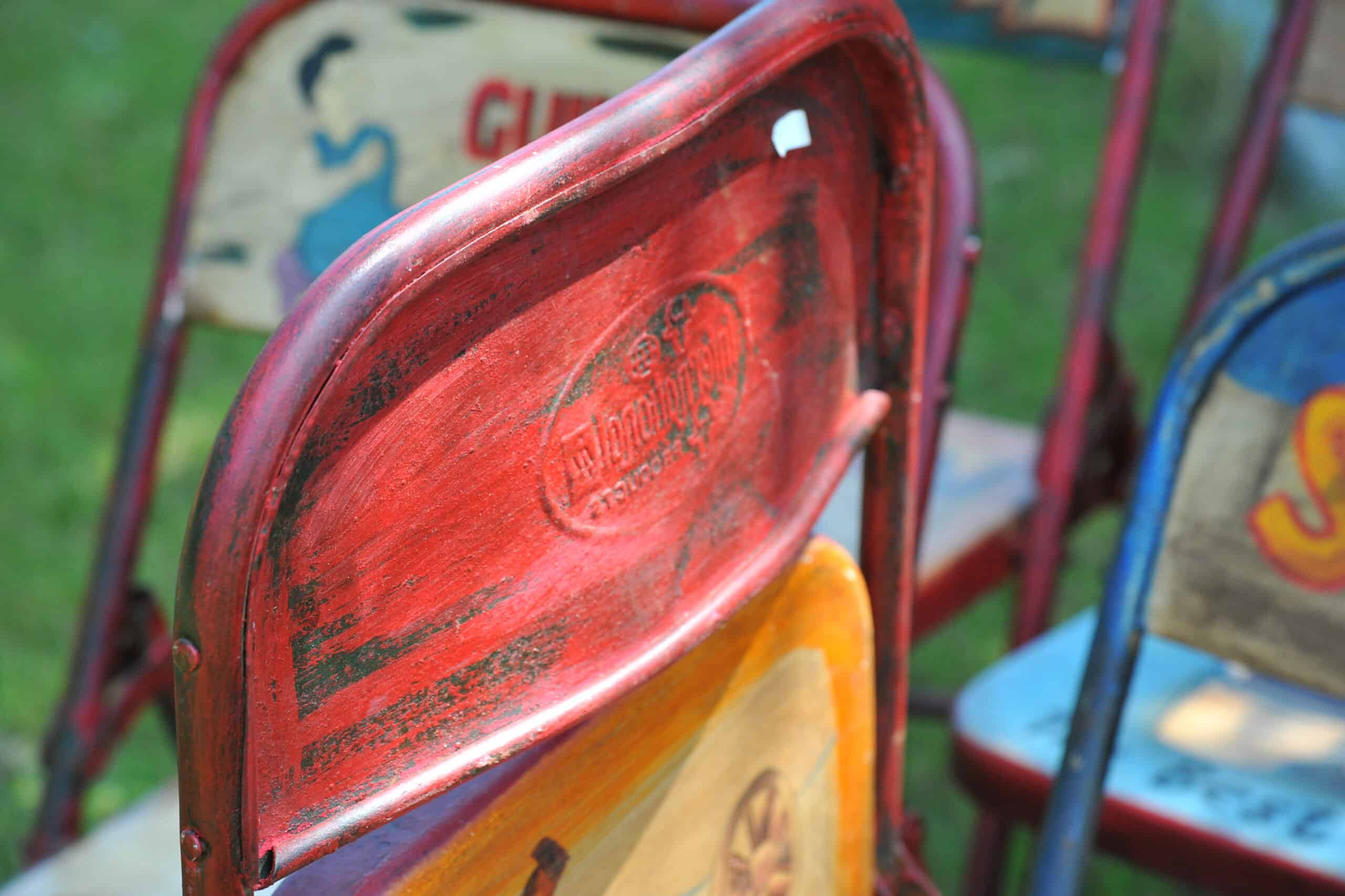 vintage folding advertising painted metal chairs