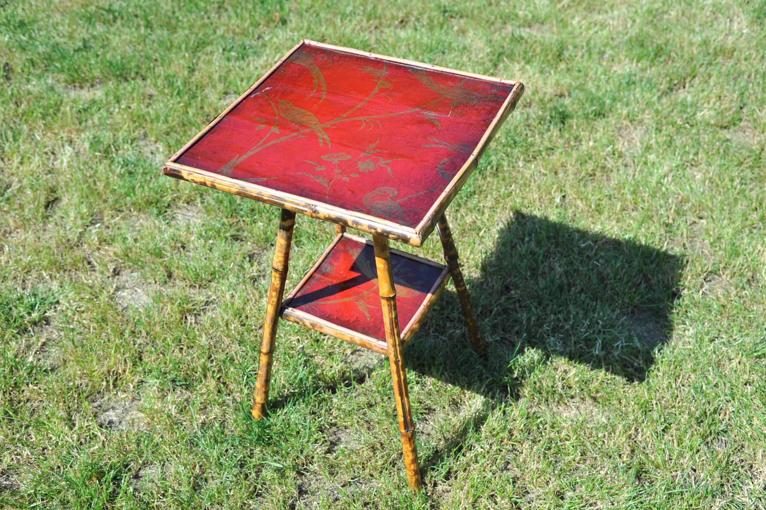 a good antique vintage two tier bamboo and lacquered panel side table