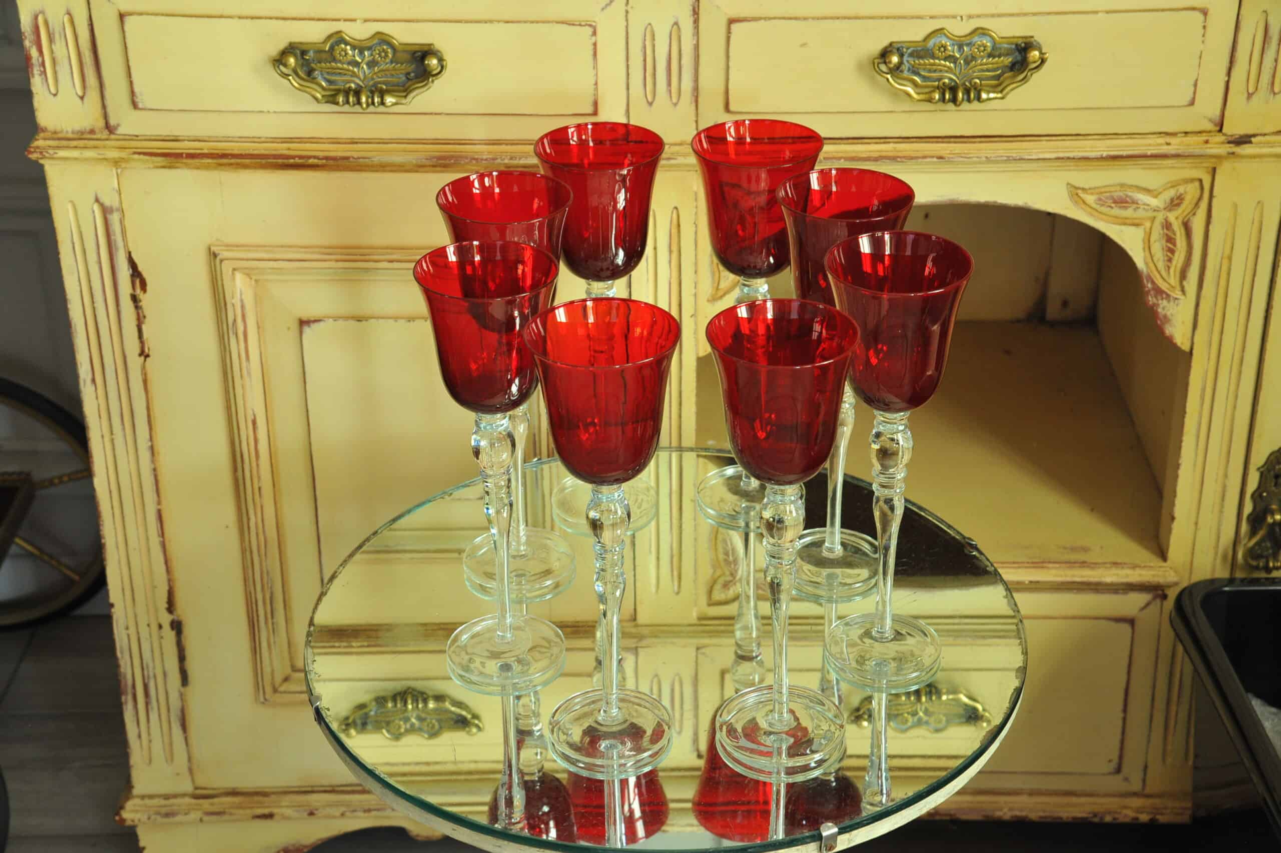 a luxury set of extremely large vintage ruby red wine glasses