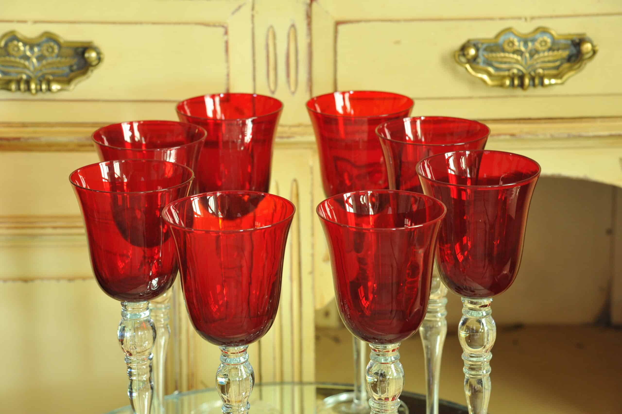 a luxury set of extremely large vintage ruby red wine glasses