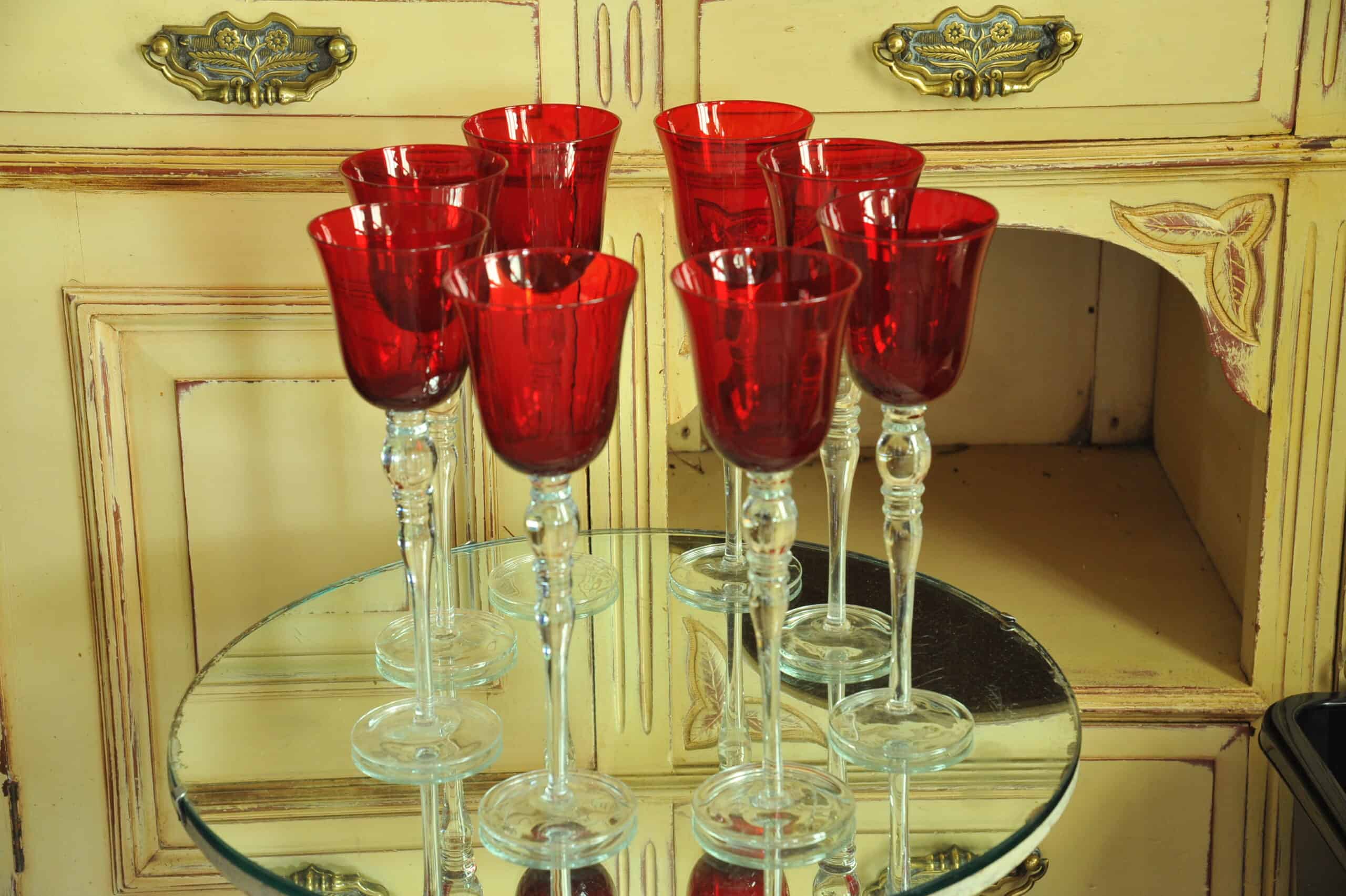 a luxury set of extremely large vintage ruby red wine glasses