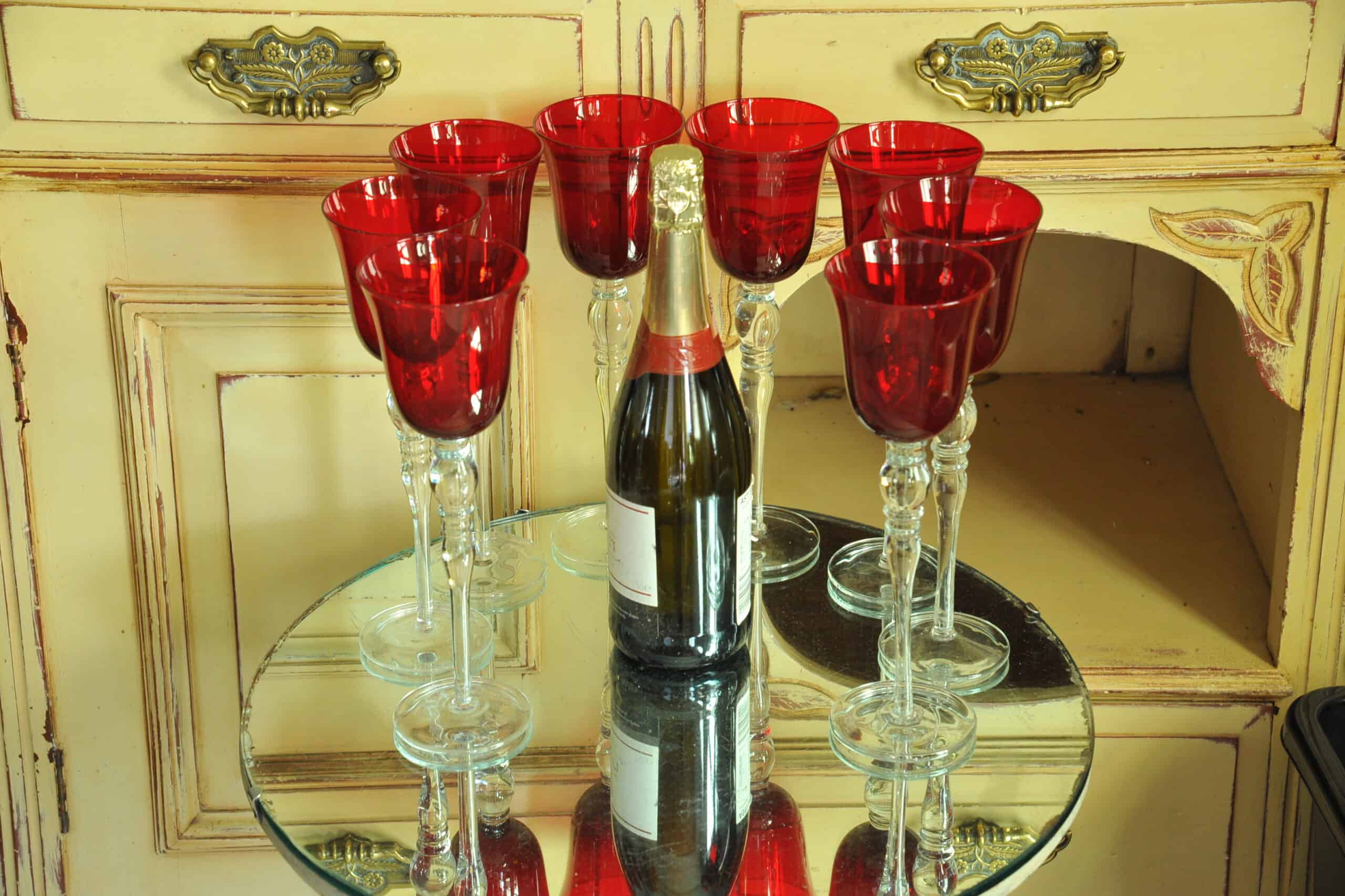 a luxury set of extremely large vintage ruby red wine glasses