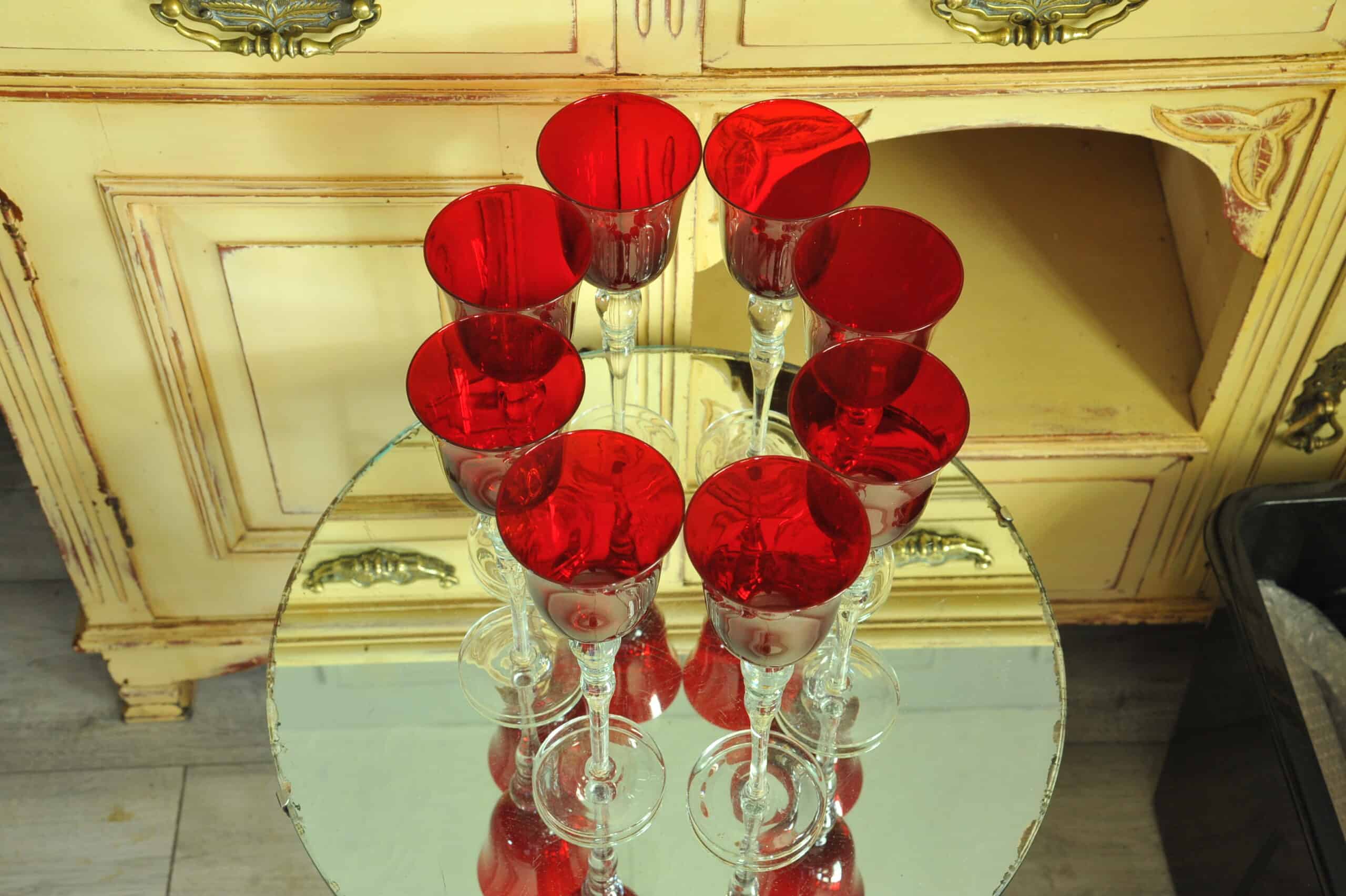 a luxury set of extremely large vintage ruby red wine glasses