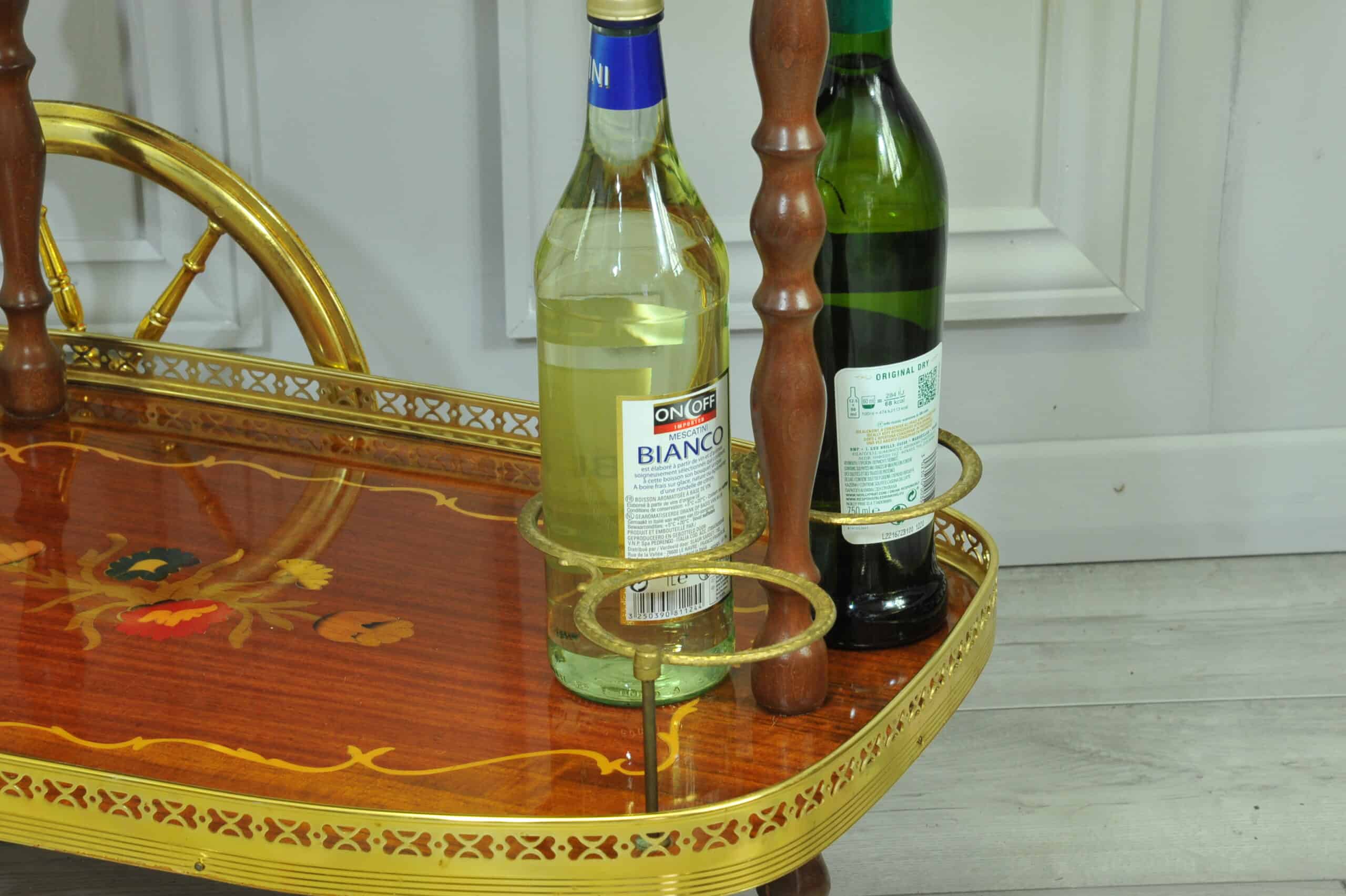 a vintage two tier brass and inlaid wood bar cart drinks trolley
