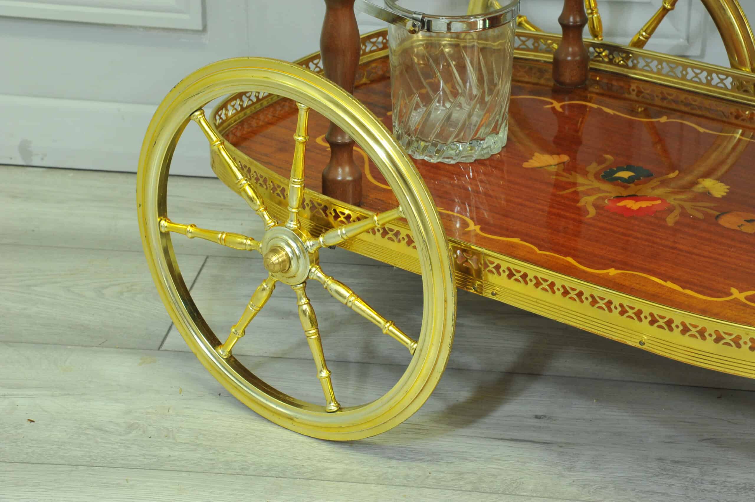 a vintage two tier brass and inlaid wood bar cart drinks trolley