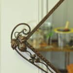 striking vintage wrought iron wall mirror