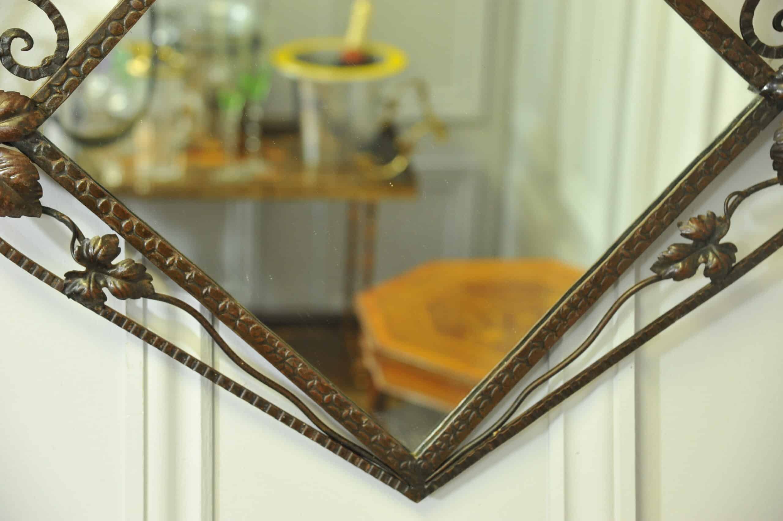 striking vintage wrought iron wall mirror