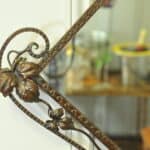 striking vintage wrought iron wall mirror