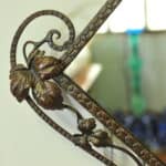 striking vintage wrought iron wall mirror