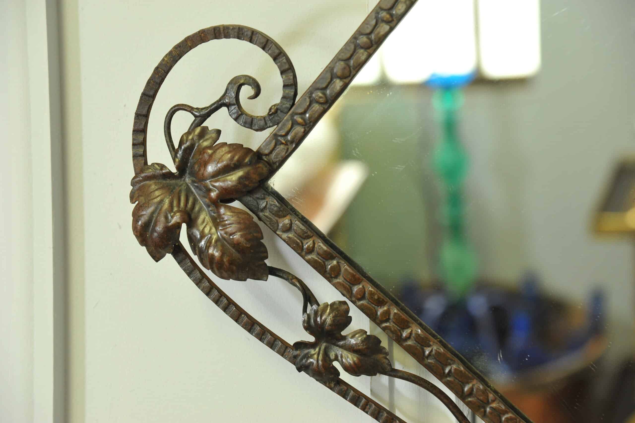 striking vintage wrought iron wall mirror