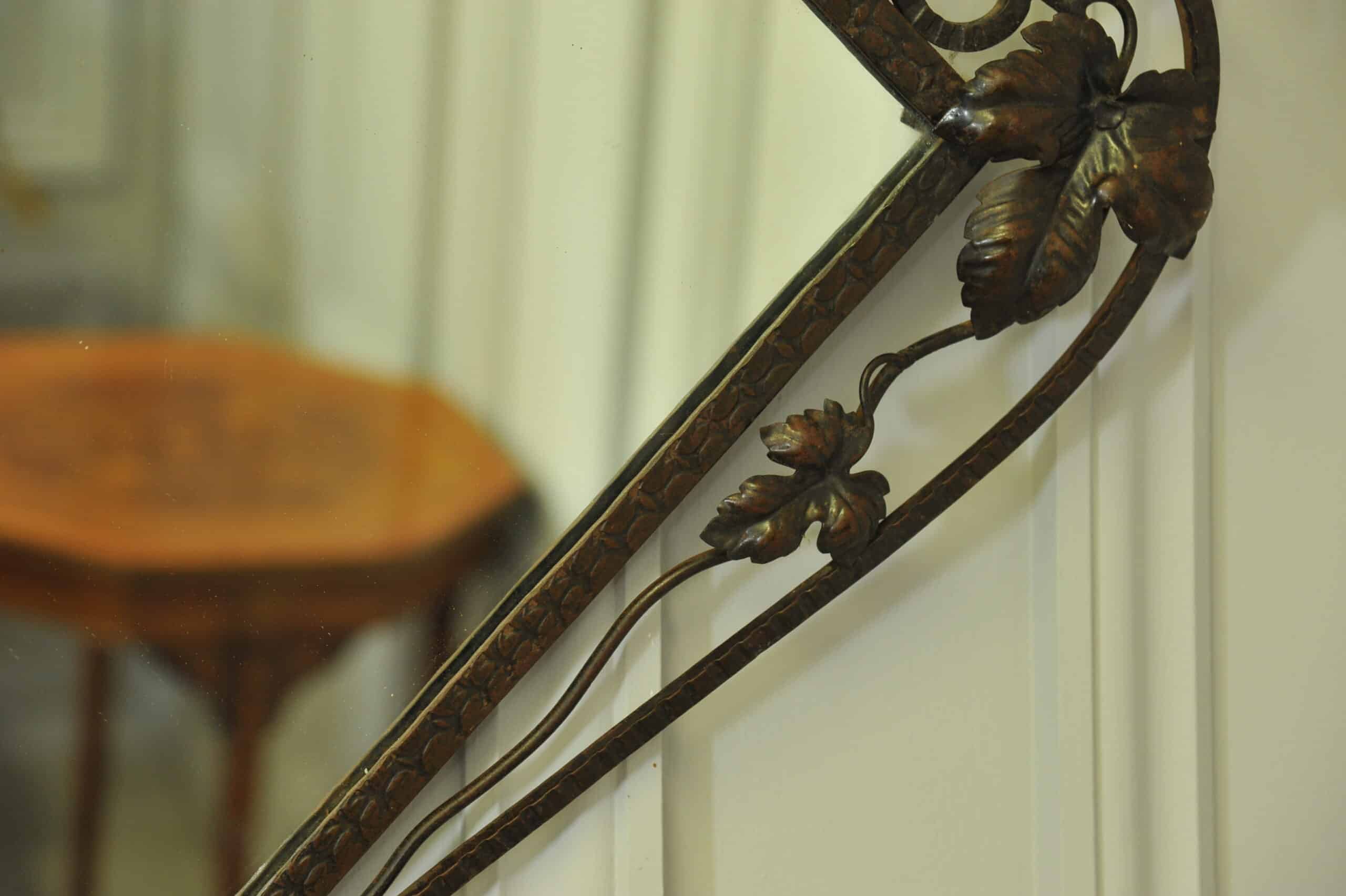striking vintage wrought iron wall mirror