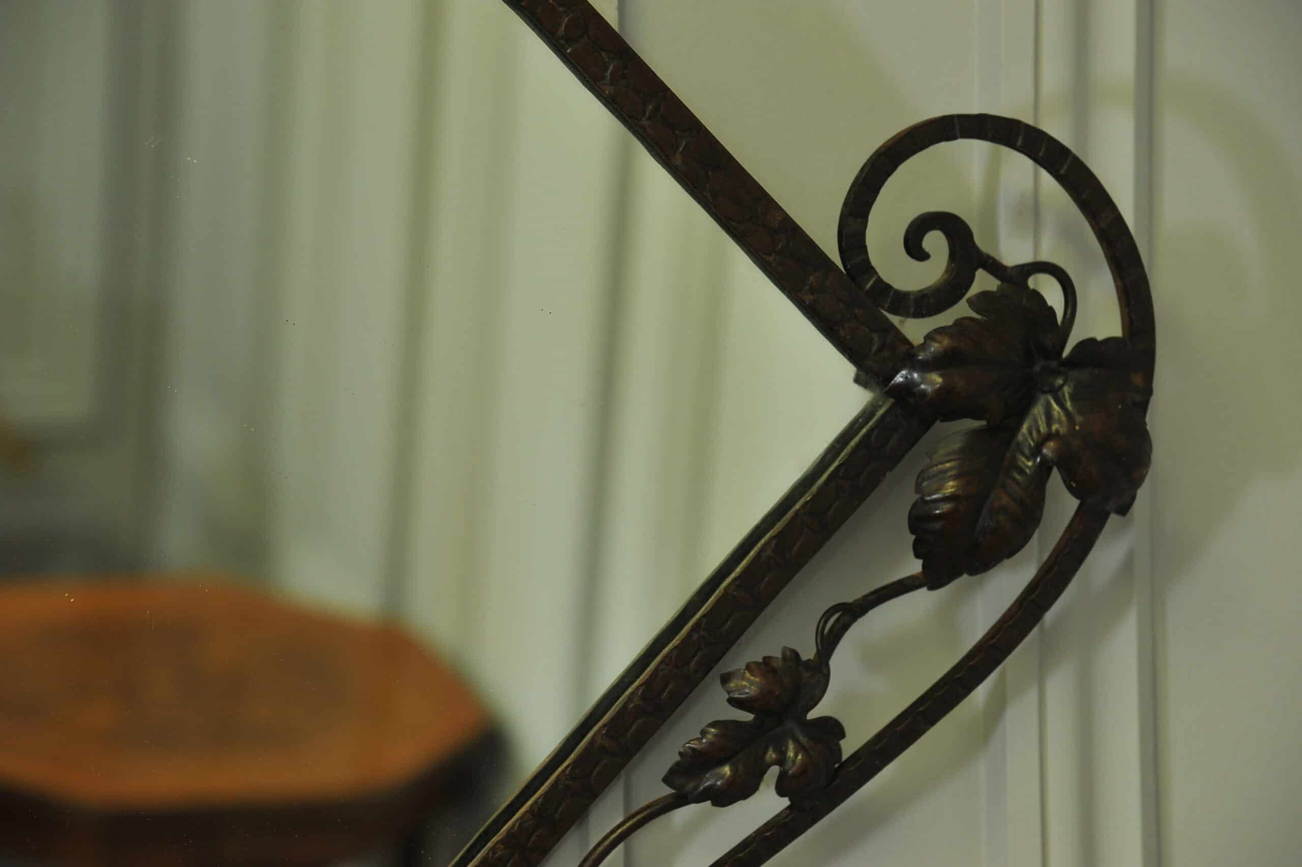 striking vintage wrought iron wall mirror