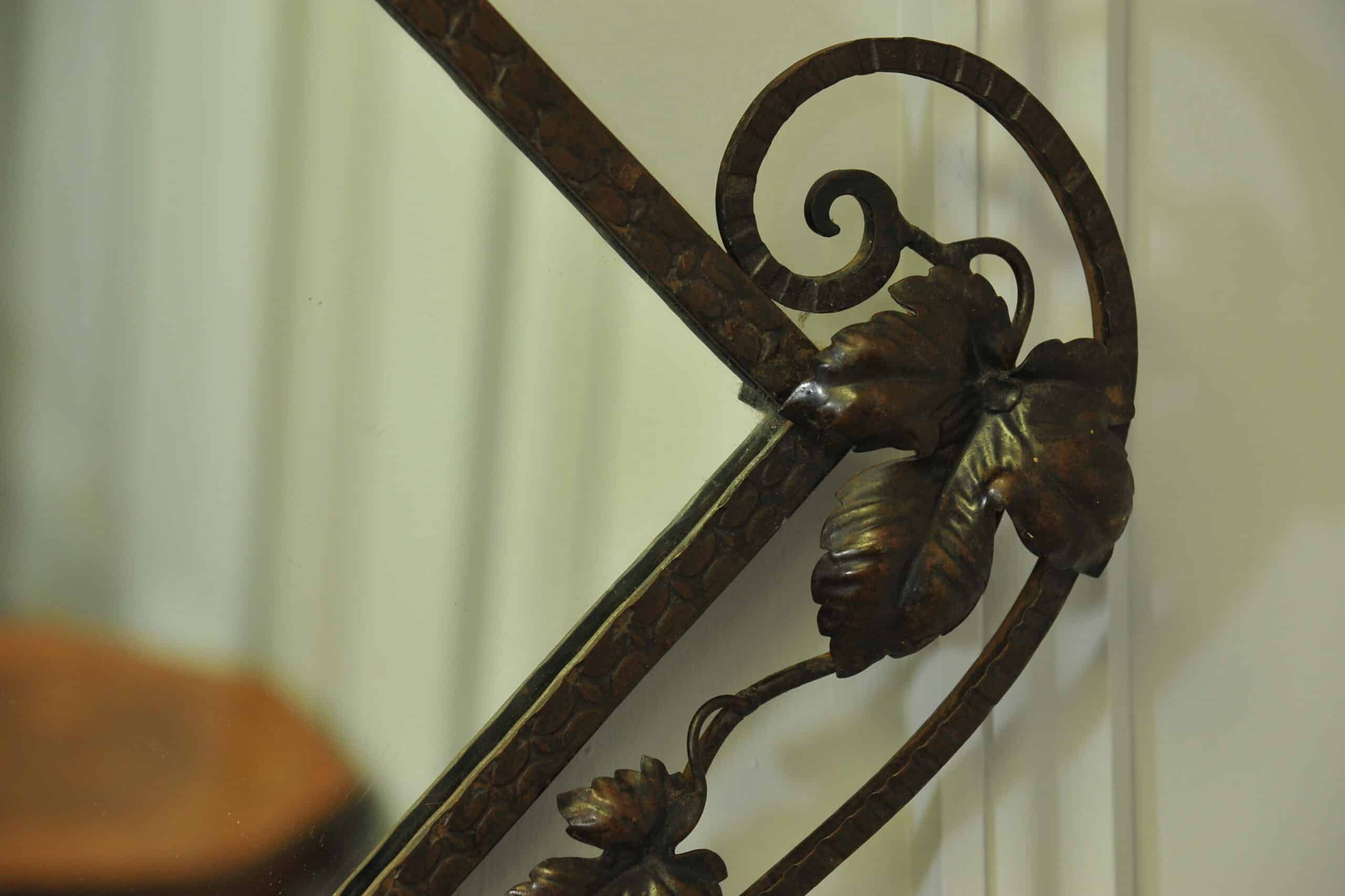 striking vintage wrought iron wall mirror