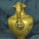 an antique brass greek trefoil oinochoe wine