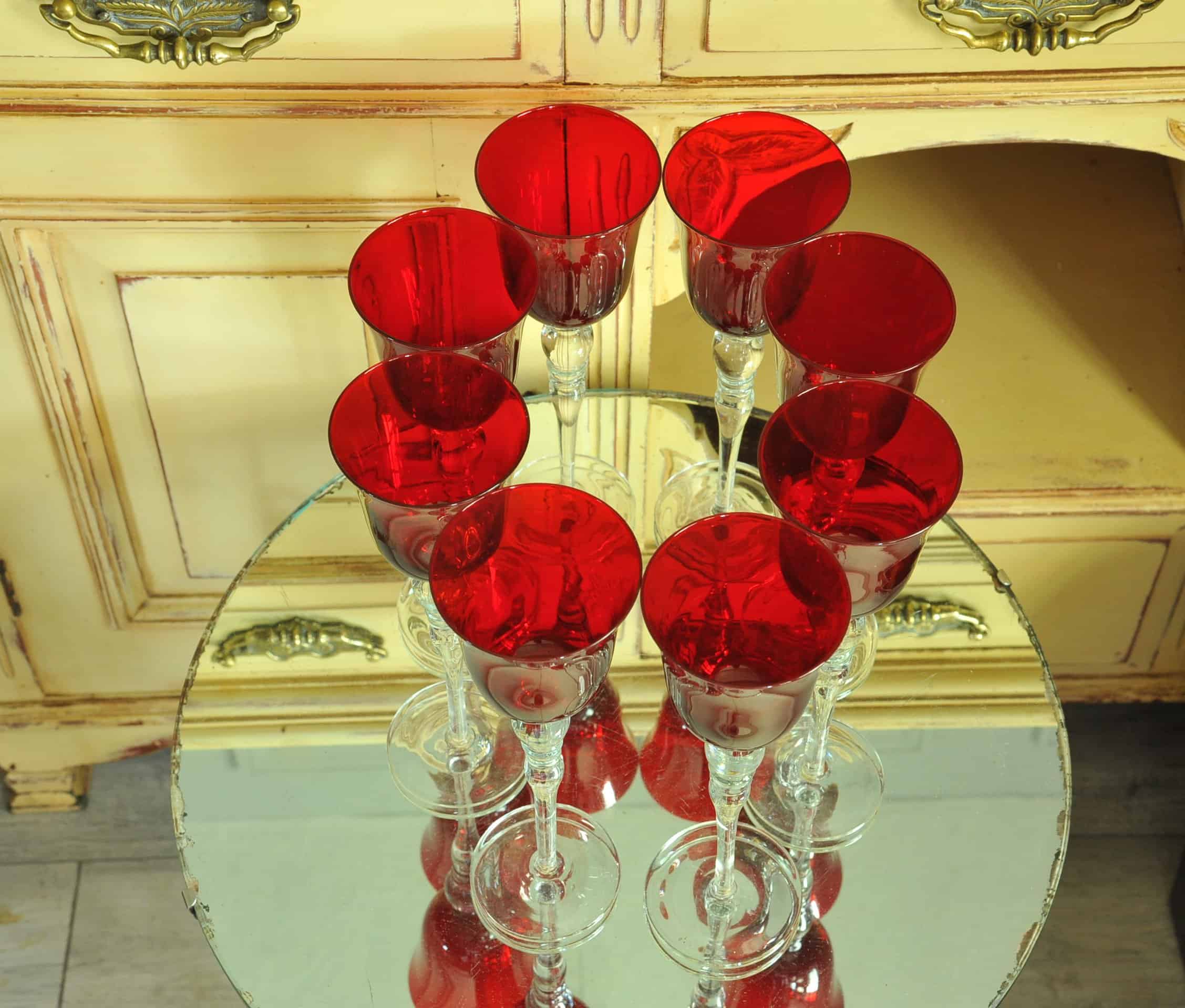 a luxury set of extremely large vintage ruby red wine glasses