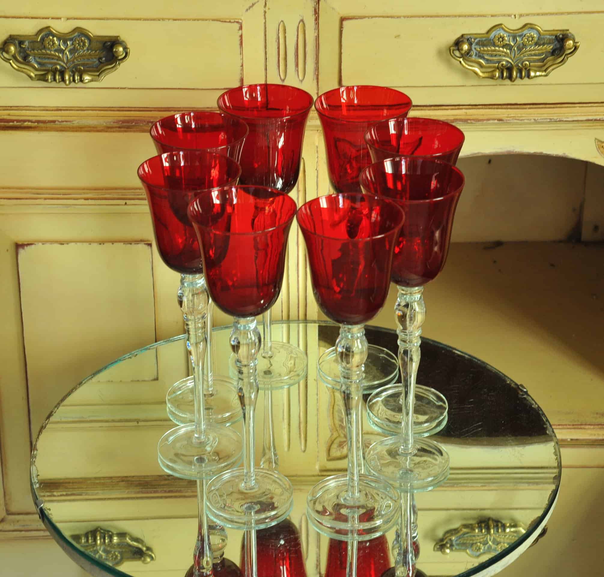 a luxury set of extremely large vintage ruby red wine glasses