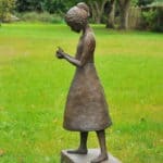 a stunning statue of a young girl