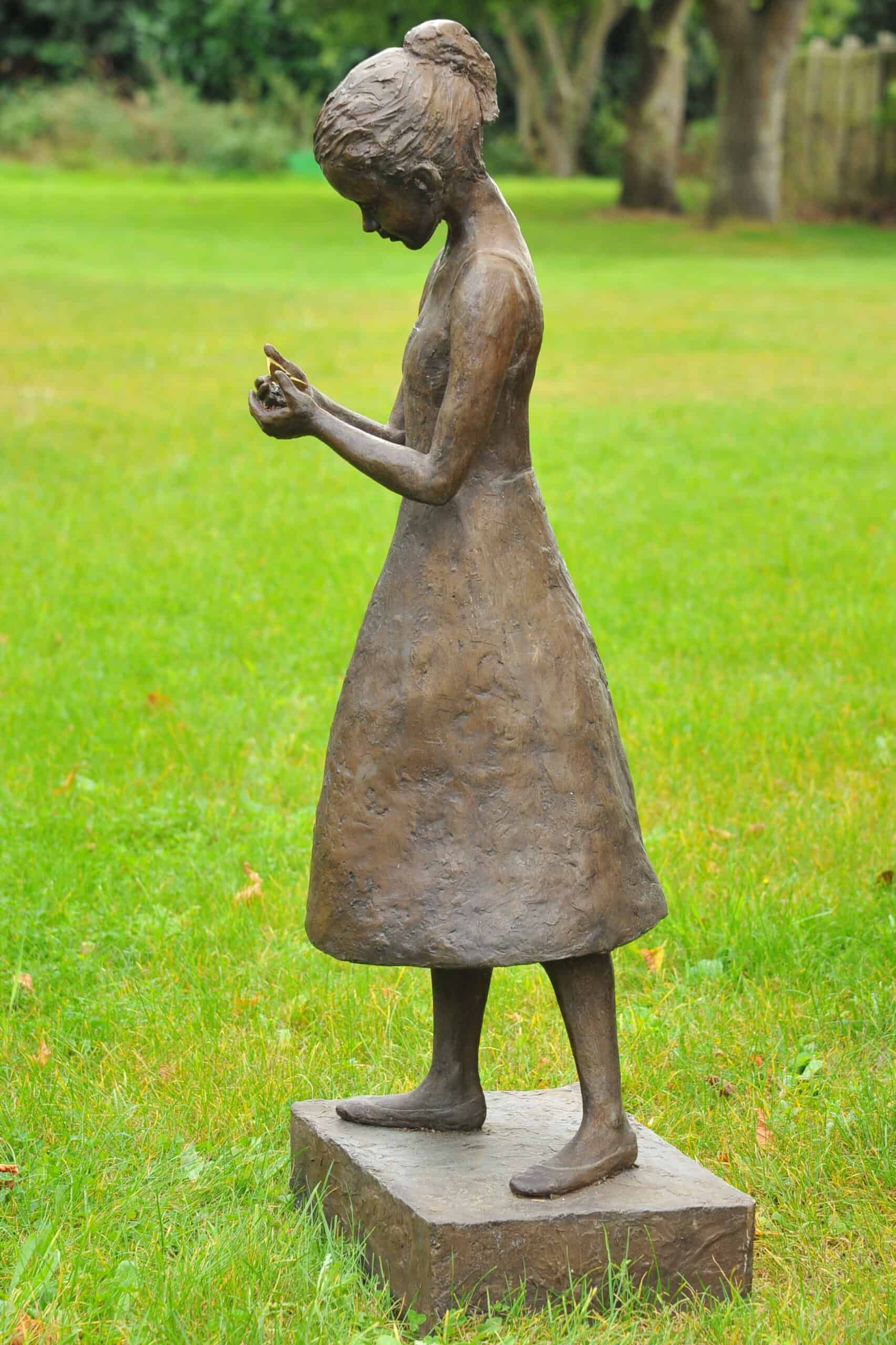 a stunning statue of a young girl