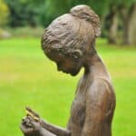a stunning statue of a young girl